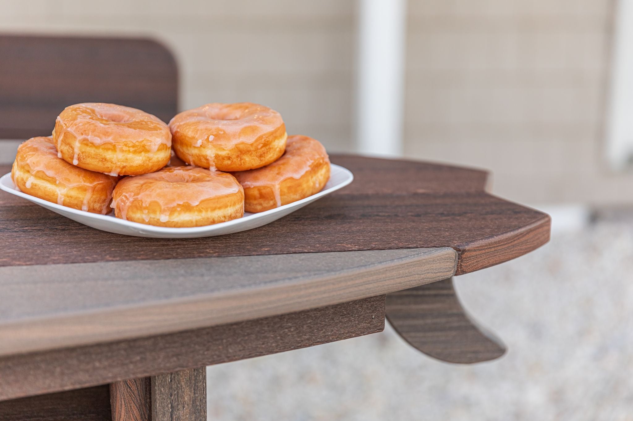 Amish made surfboard shaped outdoor table crafted from durable poly lumber, high-quality outdoor furniture designed for style and longevity