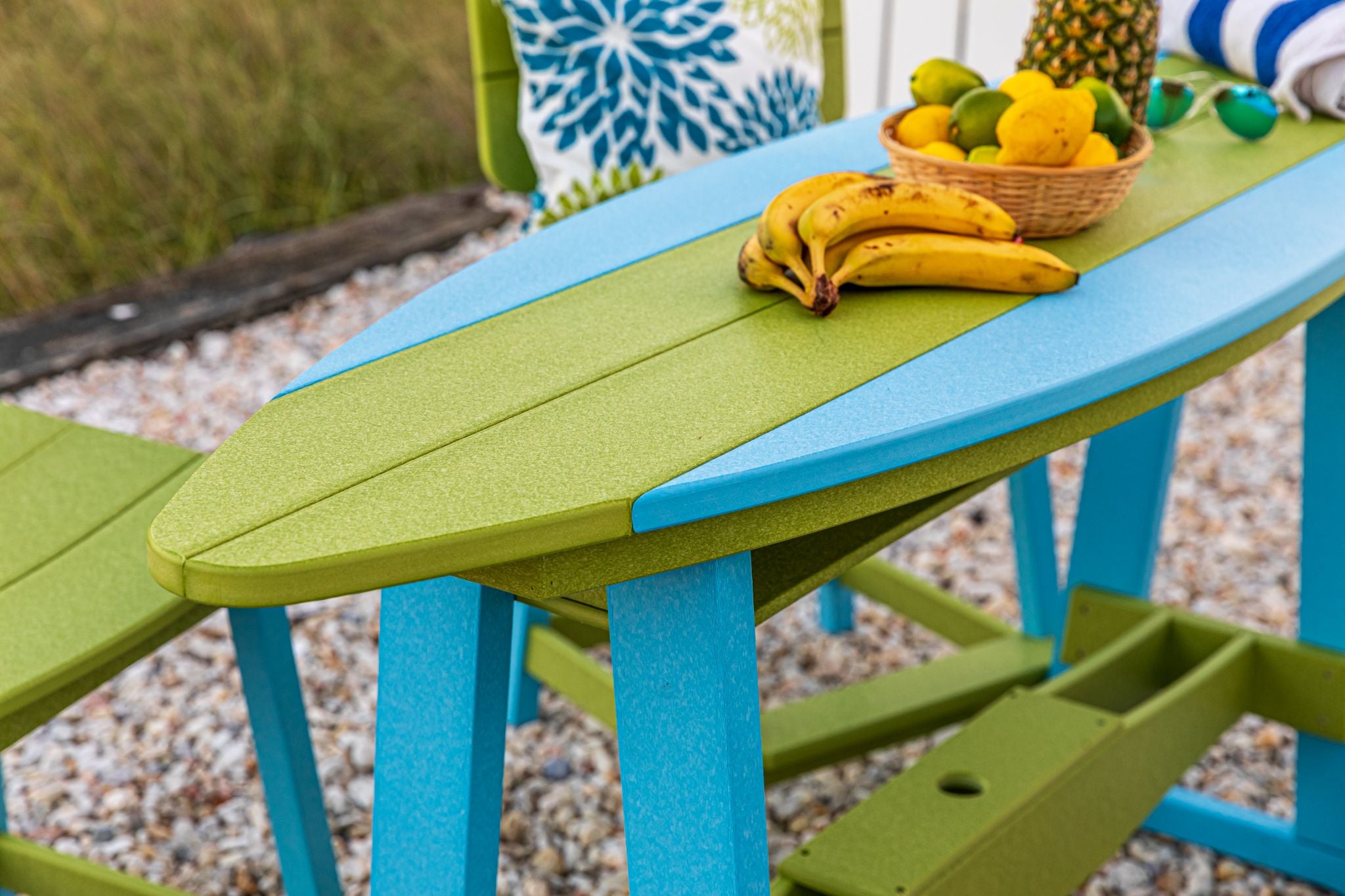 Amish made surfboard shaped outdoor table crafted from durable poly lumber, high-quality outdoor furniture designed for style and longevity