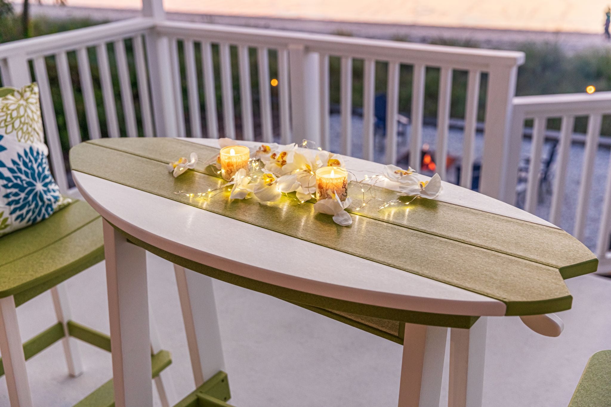 Amish made surfboard shaped outdoor table crafted from durable poly lumber, high-quality outdoor furniture designed for style and longevity